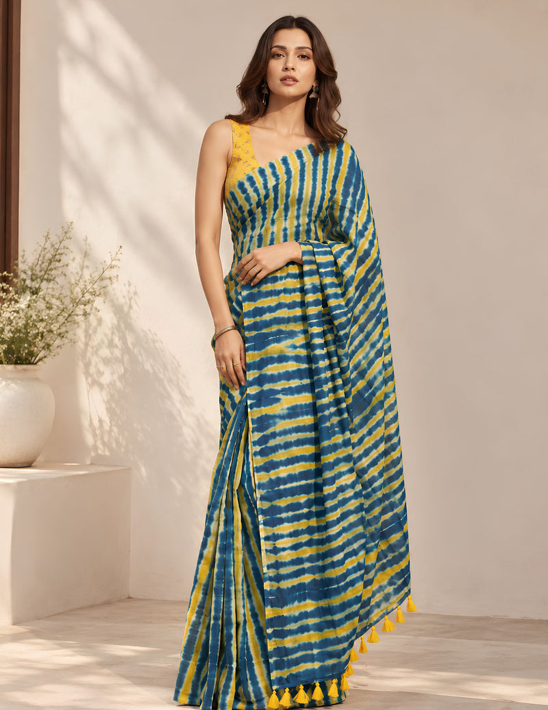 Blue and yellow tie-dye saree with attached yellow blouse