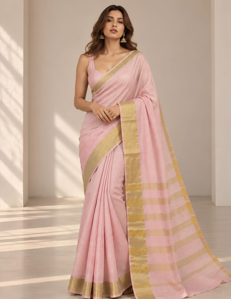 Soft pink Kerala silk saree with gold border
