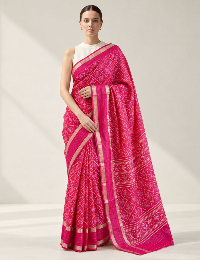 Fuchsia patterned saree displayed on a model, front view
